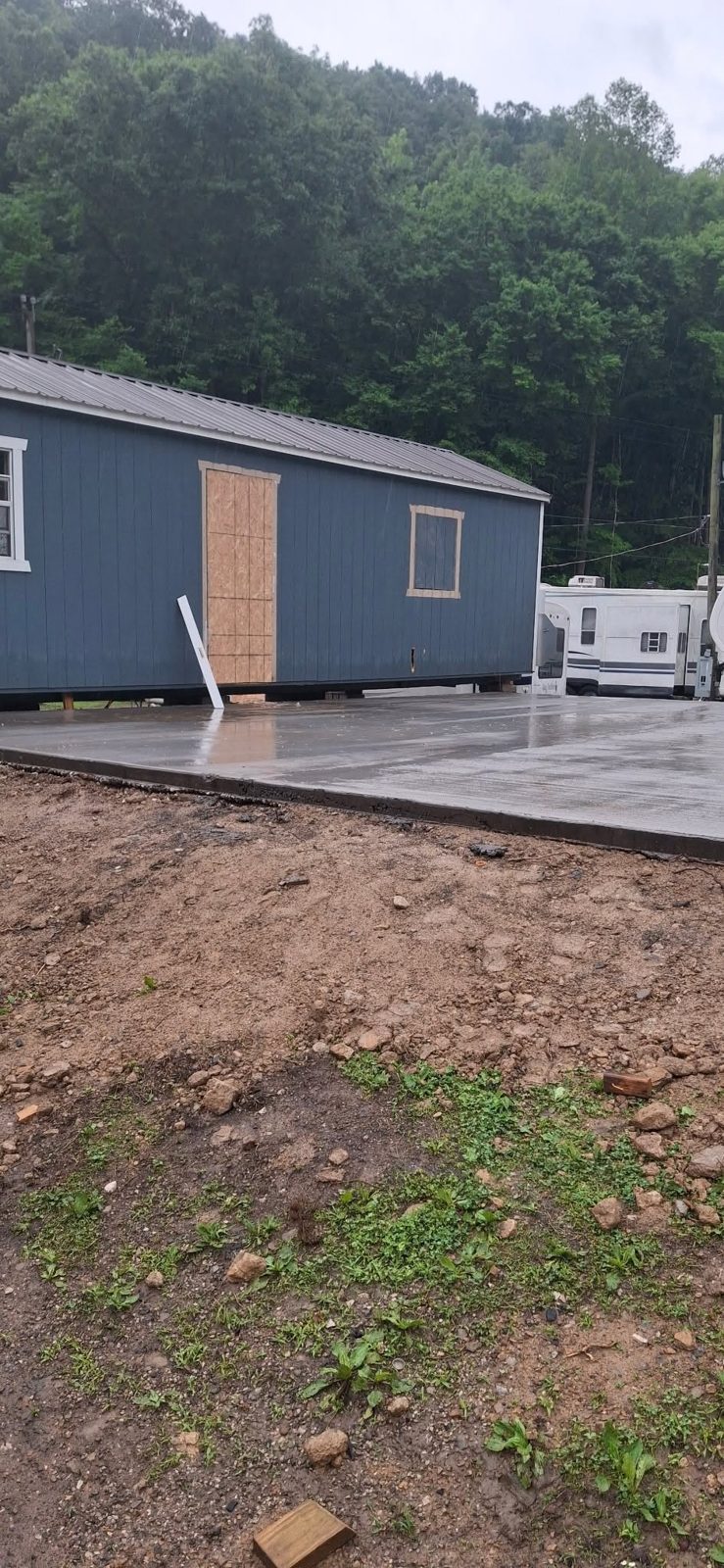 Concrete driveway, walkway and slab work by Phares Property Management