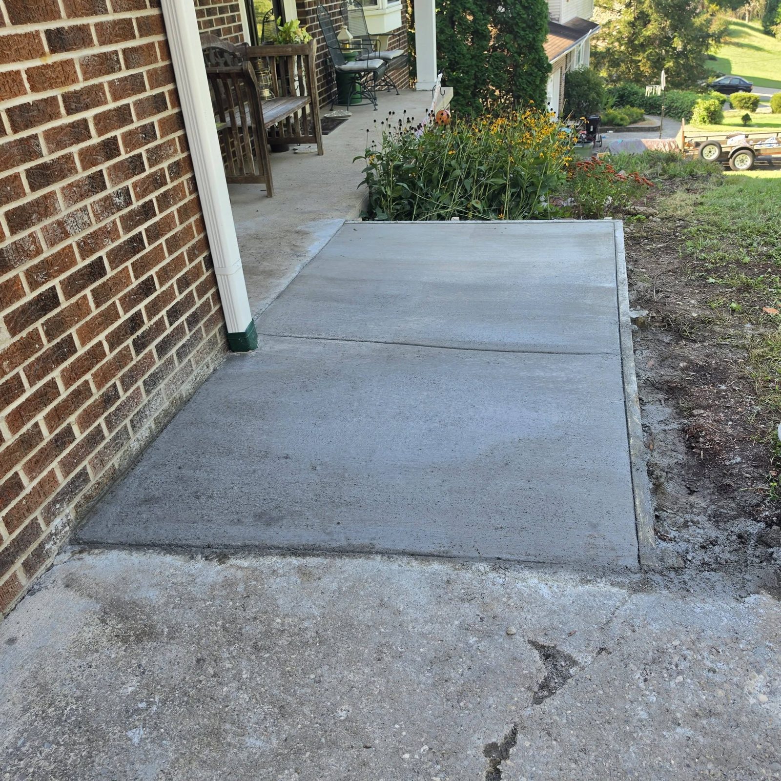 Concrete driveway, walkway and slab work by Phares Property Management